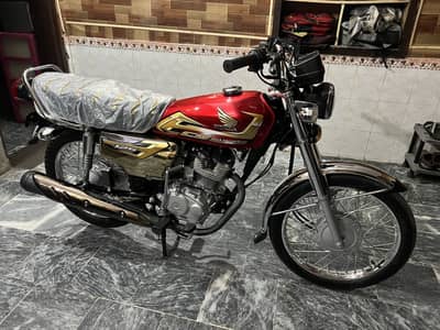 Honda 125 red special gold addition