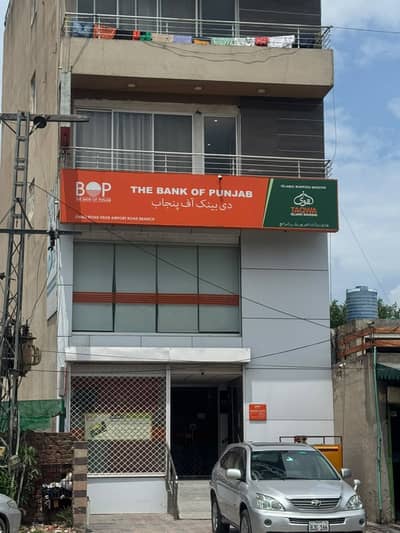 HIGH-YIELD 7.5 MARLA 7-FLOORS BUILDING FOR SALE ON AIRPORT ROAD WITH LIFT INSTALLED