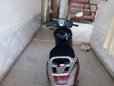 united scooty 100cc
