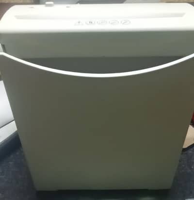 Typewriter,, laminating Machine and paper shredder or printer