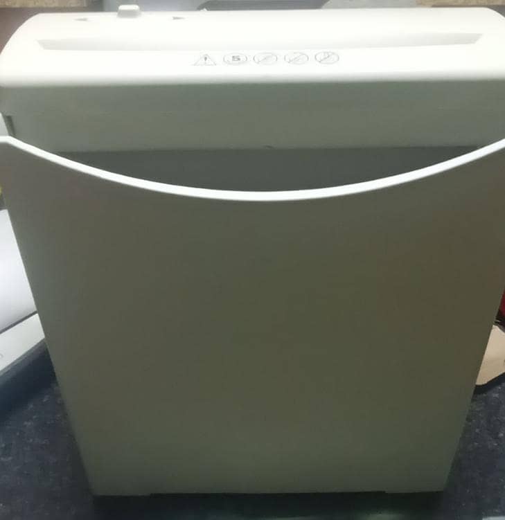Typewriter,, laminating Machine and paper shredder or printer 0