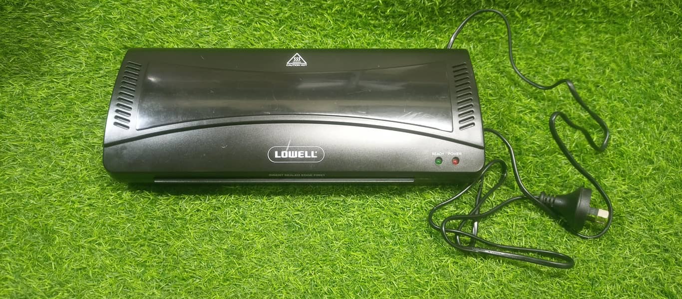Typewriter,, laminating Machine and paper shredder or printer 11