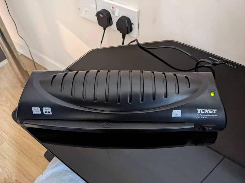 Typewriter,, laminating Machine and paper shredder or printer 15