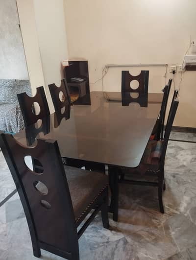 Six chair Dining table with glass top - Good condition