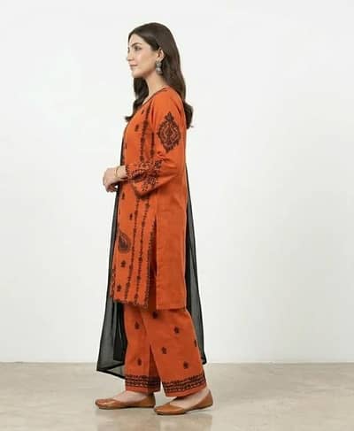 Orange printed kaurta set with black scarp