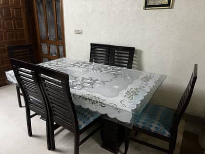 Wooden dining table with 6 chairs