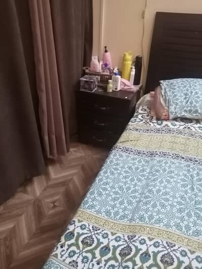 King size solid wooden bed with side tables