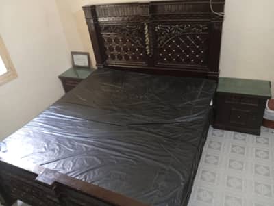 Bed set with lamp table and dressing table.