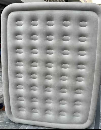Air mattress with built in pump