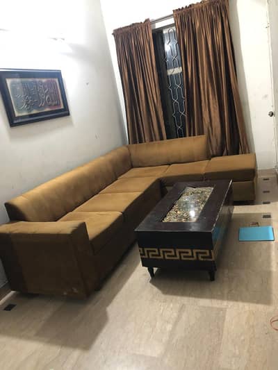 L shaped/corner sofa with cushions and center table - 6 persons