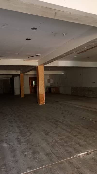 3 Kanal Warehouse for Rent in Johar Town wafaqi Colony with cargo lift for distributiom setup. , stock saving Good Location with Containor Access