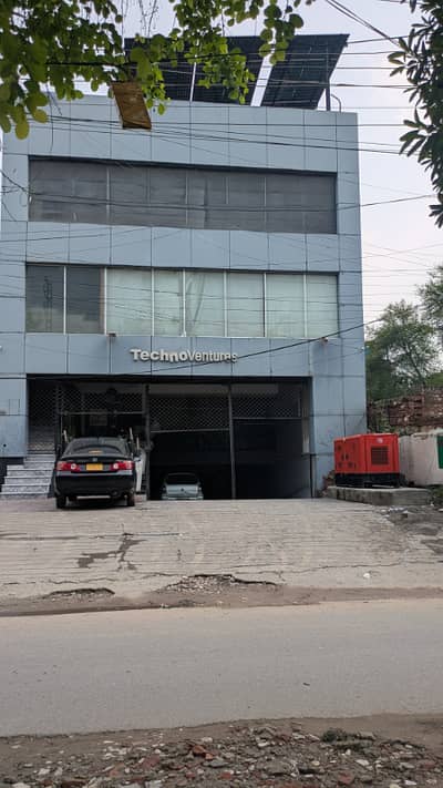 1 Kanal Commercial Plaza Available for Rent Near Khokhar Chowk Johar town Basement parking+ Ground floor Hall+3 Floors Halls Attach washrooms Best for Multinational Company or Software House or Any Brand