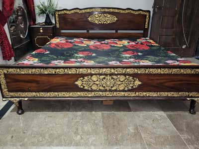 King size pure Tali wood bed price negotiable.