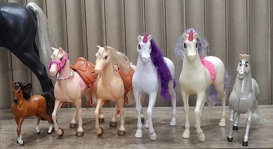 6 horse toys branded good condition