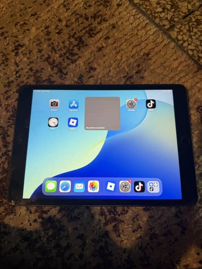 apple tab ipadios version 18.7. 9 7th generation working