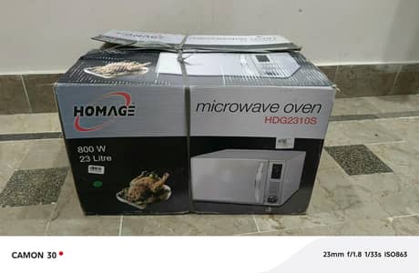 homage microwave oven  not used box peck