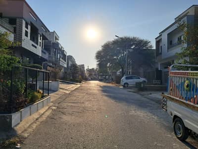 Residential plot 30x60 st#66 solid land sun face 100% level 40 feet wide road prime location available for sale in G-14/2
