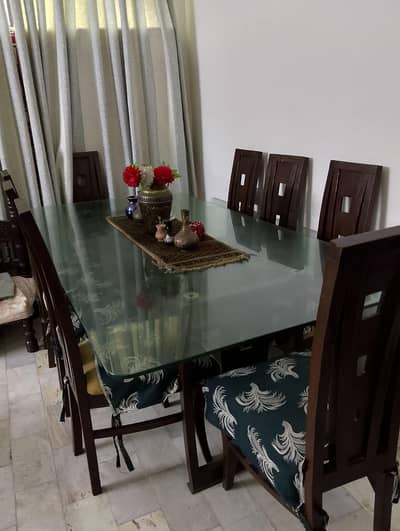 8 Chair's with solid wood dining table