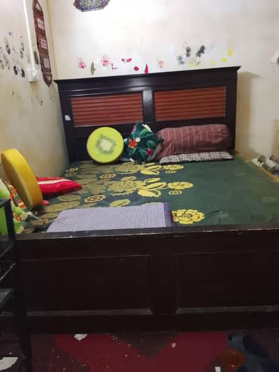 one king Size bed with two side tables