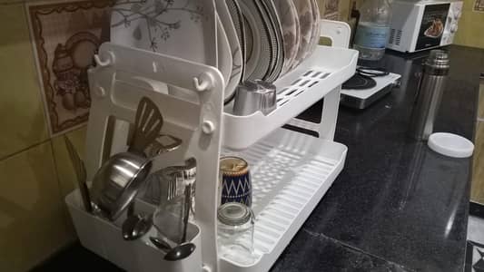 Glass and plate storage rack. Slight used