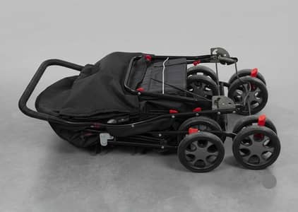 Premium Black Baby Foldable Stroller with Red Accents.