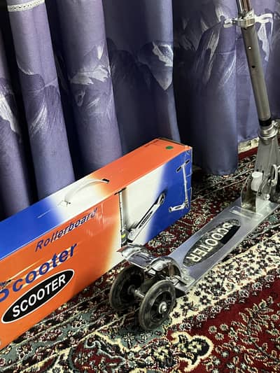 Roller board scooter