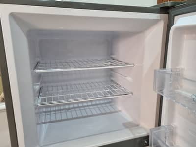 Clean and well-maintained used refrigerator for sale. It is in good wo
