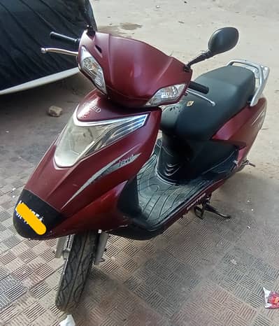 united scooty 100cc