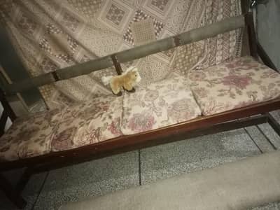 wooden bench with cushion