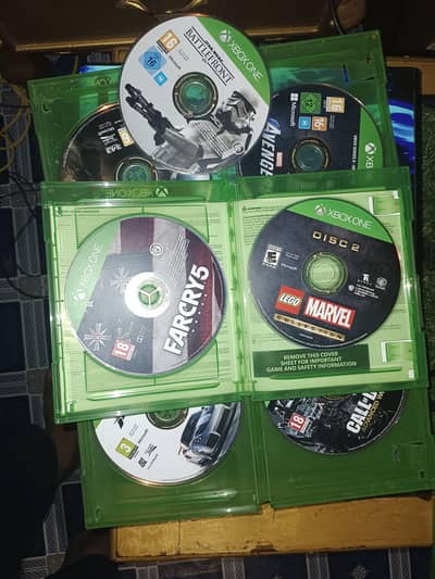 Xbox one console 500 gb 7 games install 8 DVDs games all details