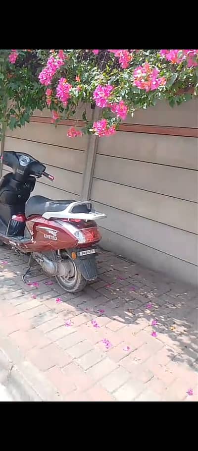 United 70cc 2021 Model - Maroon - Excellent Condition - Islamabad
