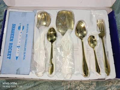 golden colour spoon and fog set