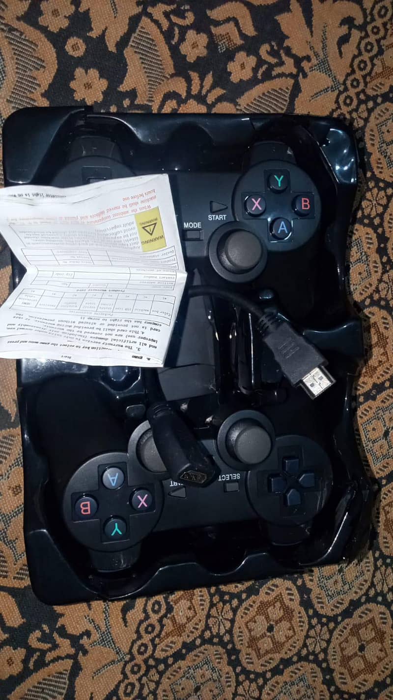 gaming cosole with two controller 0