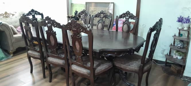 Original Chinyoti Dinning Table with 8 chairs.