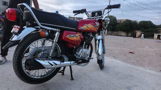 all okay bike red colour bike 2021 model Karachi number
