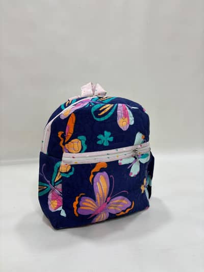 Children's backpacks with integrated bottle holders.