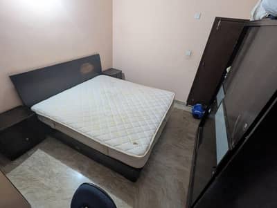 Double Bed with two side tables with cupboard