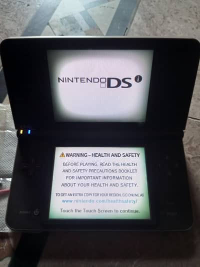 Nintendo DSi XL Bundle + Charger