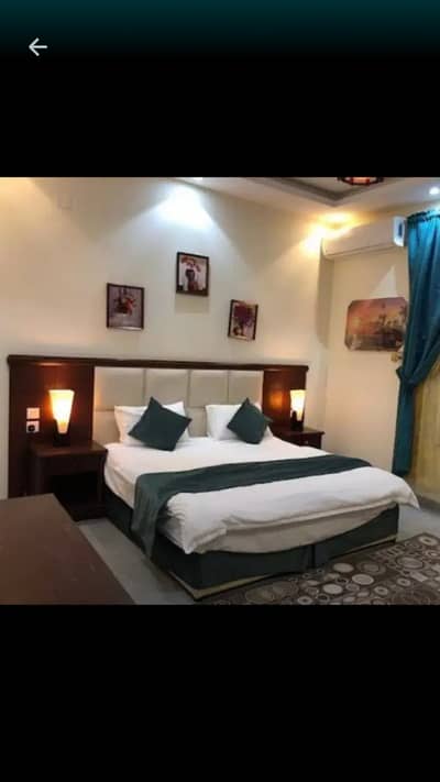 Par Day and short Time One and Two BeD Room appaertment Available Bahria Town Phase 4 and 6 Empire Heights 2 family apartment any time available