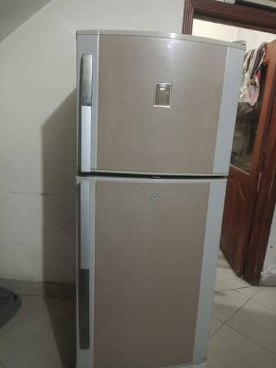 Dawlance fridge medium size neat clean urgent sale