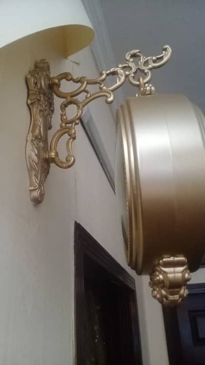 Two faced wall clock