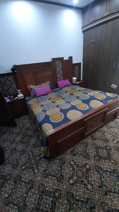 wooden bed just in 70000