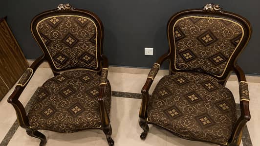 Pair of wooden armchairs