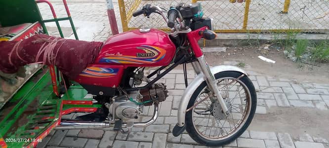 united 100 cc use me Lahore mana vala stop available