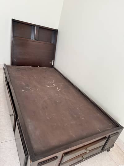 Single Sheesham Bed dismantled from Headrest.  Solid bed and side ta.