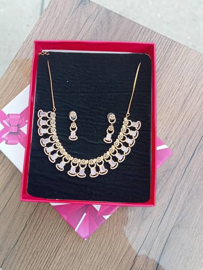 Artificial gold plated set