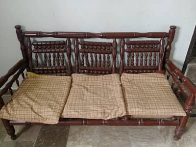 wooden sofa with table