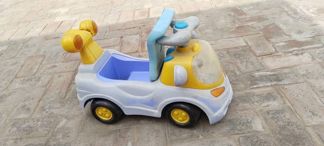 kids 4 wheel ride on car with toy storage