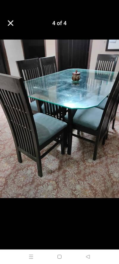 wood dining table with chairs