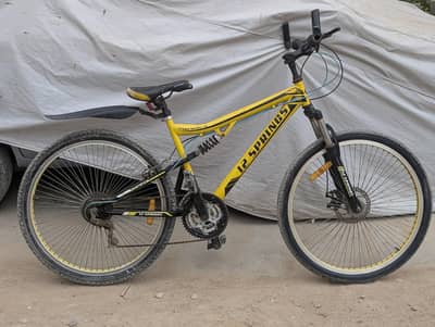 yellowm frame dual shocks mountain bike